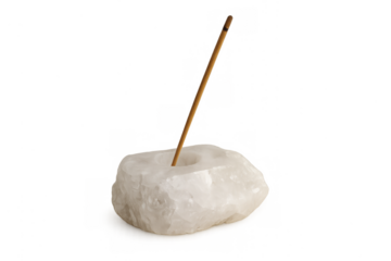 Incense stick burning in quartz crystal holder