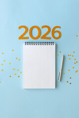 New Year 2026 planning concept with notebook and golden numbers for your goals, plans, resolutions....