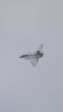 Fighter jet preforming high speed maneuvers showing its abilities