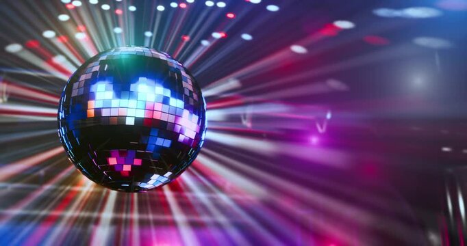 VJ loop. Dance music. Intro for a music track. Disco style. Bright lights. Looping 3D animation of a rotating disco ball. Retro disco animation. Smooth rotation of the disco ball with reflections.