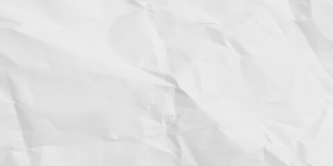 White crumpled paper background with a textured, wrinkled style. White crumpled paper background with a textured, wrinkled style. 