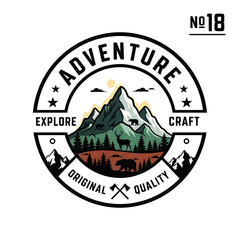 Adventure Emblem Mountain Peak Forest Wildlife and Crossed Axes in Circular Design.