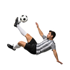 Male soccer player kicking a ball in midair, isolated on transparent background