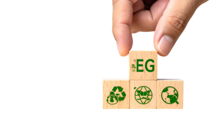 Hand placing a "EG" block atop two cubes with recycling, globe, and world icons, set against black