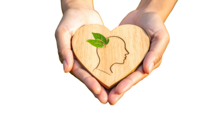 Hands cradling a wooden heart cutout with a person's head & plant, symbolizing mental health