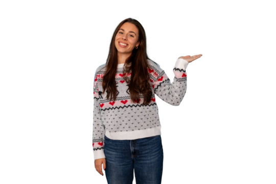 Young woman smiling, wearing a christmas sweater, presenting and showing an empty space, transparent background - Powered by Adobe