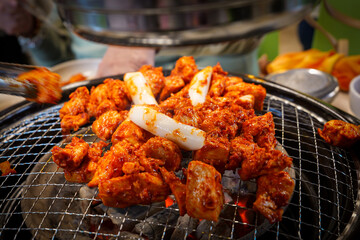 Dak-galbi spicy chicken grilled over hot charcoal.