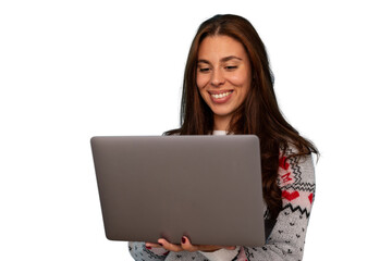 Naklejka premium Woman smiling, holding laptop, wearing a christmas sweater on transparent background, enjoying holiday online shopping