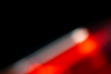 A red abstract background with a glowing laser light pattern provides a dynamic digital art texture for a business design backdrop