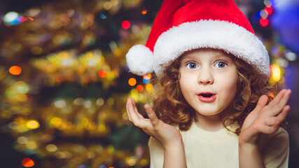 Beautiful little girl in Santa hat