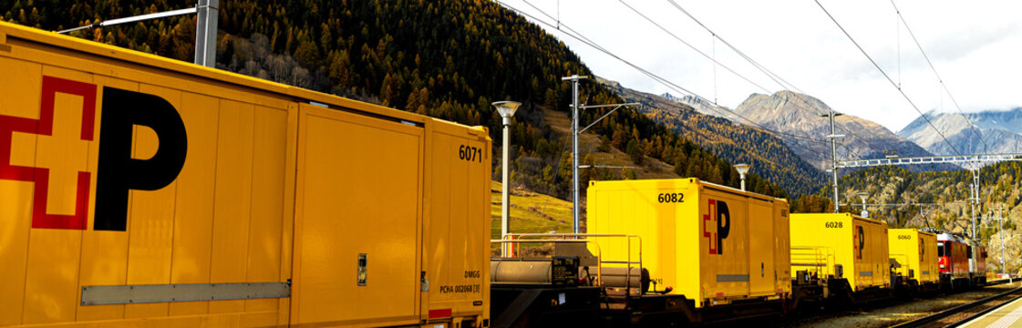 zernez, graubuenden, switzerland - 21 10 2025: a train of the swiss post panorama
