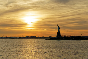 statue of liberty at sunset