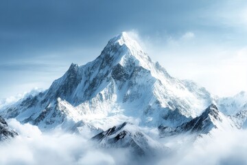 Obraz premium Majestic snow-capped mountain towering over the clouds in a clear, serene blue sky