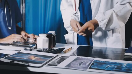 Diverse healthcare professionals discussing patient care strategies in a team meeting. - Powered by Adobe