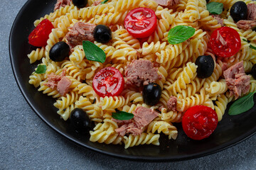 Tuna salad, fusilli pasta, olives and cherry, olive oil, homemade,