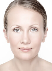 Obraz premium Young woman face portrait having natural healthy skin.