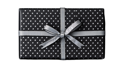Modern gift in matte black paper with minimalist white dot pattern and thin white ribbon, sleek and elegant, isolated on white background