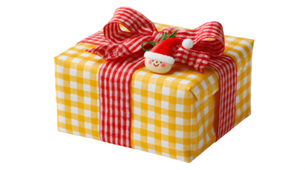 Playful gift in yellow gingham paper with red bow and illustrated Santa hat charm, cheerful pattern, isolated on white background