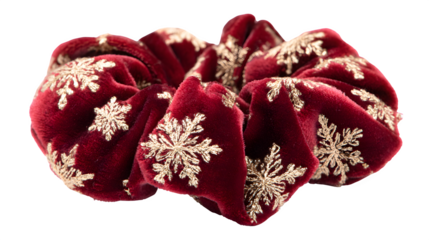Red velvet hair scrunchie with gold thread snowflakes and soft elastic, festive and gentle on hair, isolated on white background