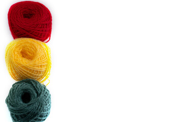  soft colorful woolen yarns on white background