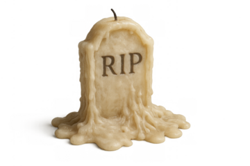 Halloween gravestone candle melting with rip inscription