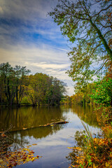 Obraz premium Autumn River Reflection