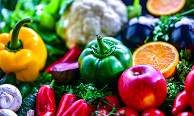 Fresh raw vegetables and fruits. Ingredients of vegan diet