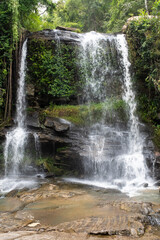 Beautiful waterfall on a green jungle in Chiang Rai national park, Thailand