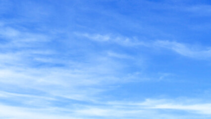 Blue sky with white fluffy cloud. Cumulus clouds background. Cloudscape morning sky. The concepts of freedom of life, never give up and positive though energy.