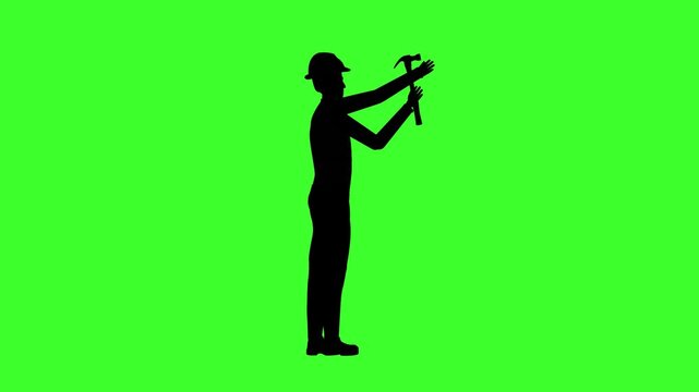 Man silhouette worker with hammer green screen