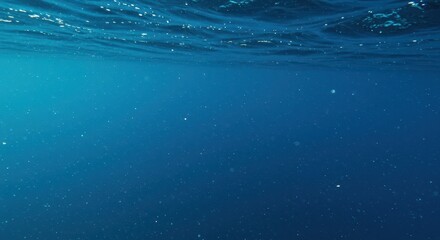 Obraz premium Deep blue and turquoise abstract ocean background with shimmering glitter texture and fluid underwater movement, perfect for design ,mystical, aqua, swirl