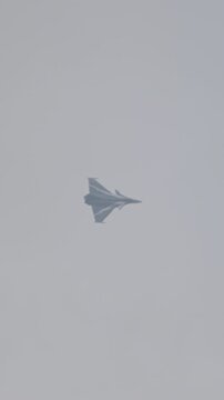 Fighter jet preforming high speed maneuvers showing its abilities
