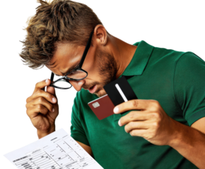 A Young Man with Glasses Examining Financial Documents While Holding Credit Cards, Depicting Modern Banking Challenges and Consumer Awareness isolated on transparent background