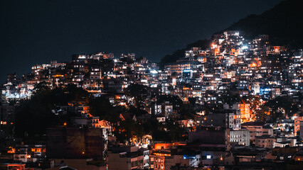 Night view of Pavao Pavaozinho favela in Rio de Janeiro, Brazil, captured with long exposure,...