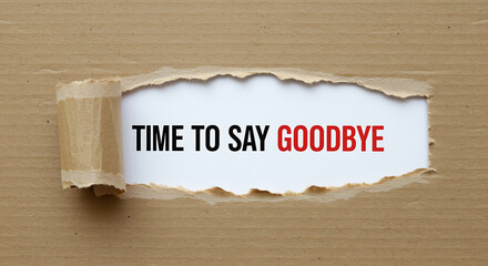Torn paper revealing text message time to say goodbye