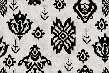 Black and gray Ikat pattern featuring traditional ethnic motifs and a textured background. perfect for fabric prints, wallpaper, wrapping paper, fashion textiles, and digital backgrounds