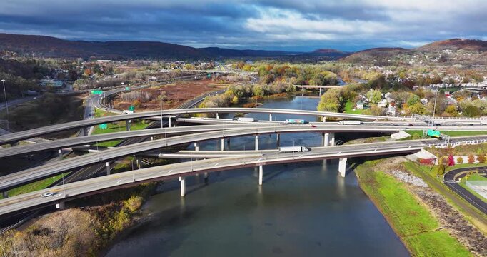 Fall afternoon aerial video of the Interstate 81 and Route 17 interchange north of Binghamton, NY.