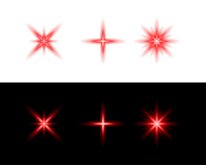 Obraz premium Set of Red Glowing Lens Flare Starburst Effects on Black and White Backgrounds