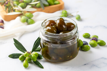 Green fresh olive jam. Food concept photo.