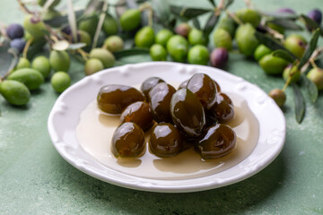 Green fresh olive jam. Food concept photo.