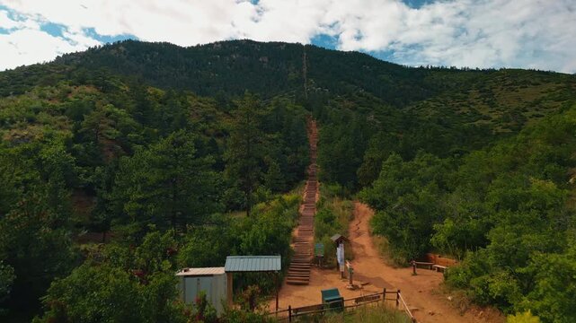 Flying up to the stairs on the trail to the mountains. Travelling by the Manitou Incline, Colorado, USA.