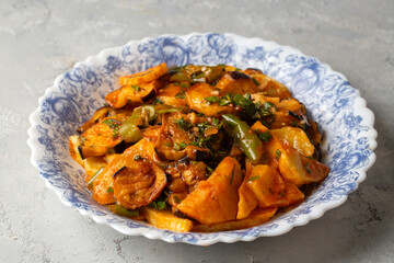 Mixed vegetable fries with sour sauce, also known as appetizers from Turkish cuisine. Turkish name; Karisik eksili kizartma patates, patlican, biber.