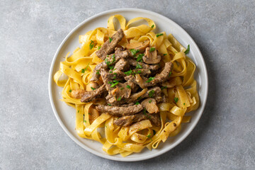 Fettuccine pasta with creamy mushroom sauce and stroganoff