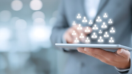 HR Manager Using Tablet with Floating Employee Icons, Human Resources and Recruitment Concept, Office Background, 16:9