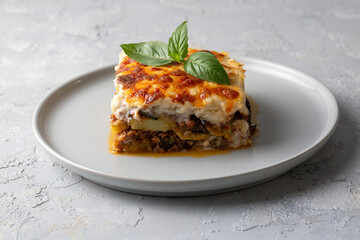 Traditional Greek potato and meat casserole with cheese - moussaka