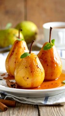 Delicious Poached Pears with Cinnamon and Caramel Sauce.