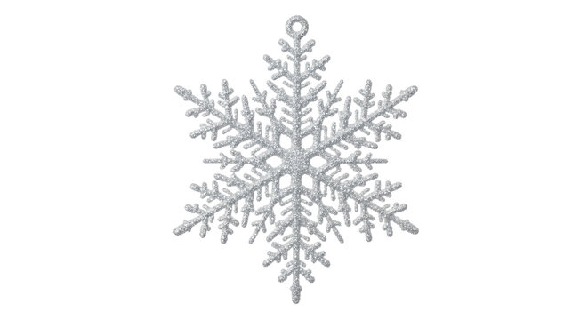 Intricate silver snowflake ornament on black background for festive decoration