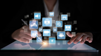 Multimedia technology with video, audio, photo and streaming icons representing digital media, communication and online platforms in a modern multimedia world. Entice