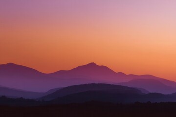Serene Mountain Sunset Orange and Purple Hues