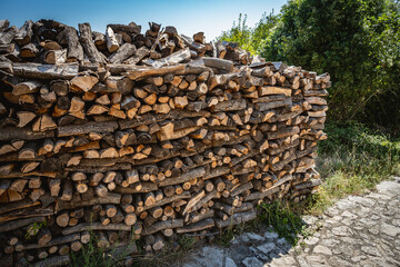 Firewood gathered and prepared for use, left to dry in the summer sun at the village of Lubenice, Croatia on Cres island